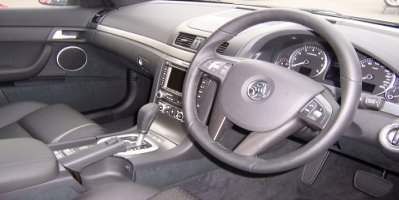 Interior Of Australian Sedan - Showing Steering Wheel And Pedals On The Right