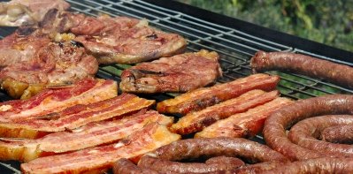 Meat Sizzling on a BBQ Grill